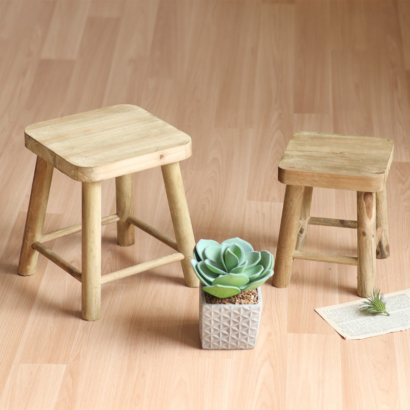 Robust stool made of solid wood