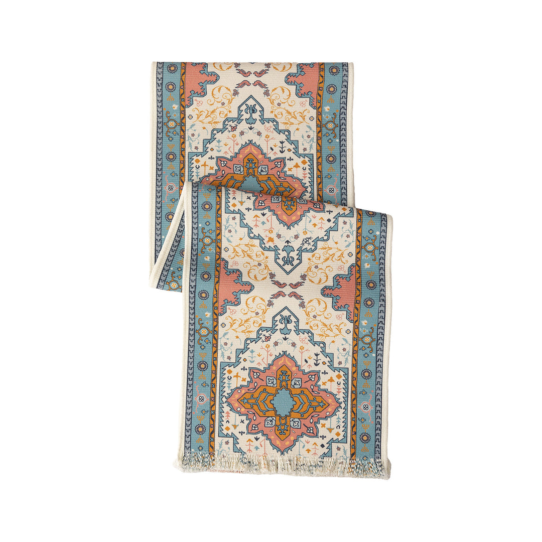 Woven table runner made of cotton blend with oriental medallion pattern and fringes