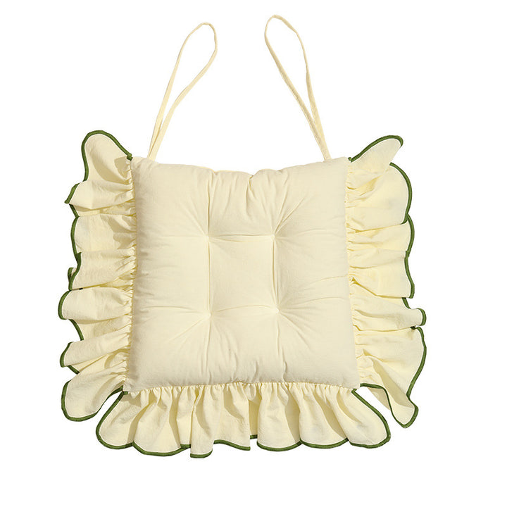 Padded chair cushion with ruffle and ties