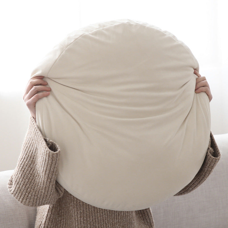 Round seat pouf with soft velvet cover, removable zipper, and shape-stable filling