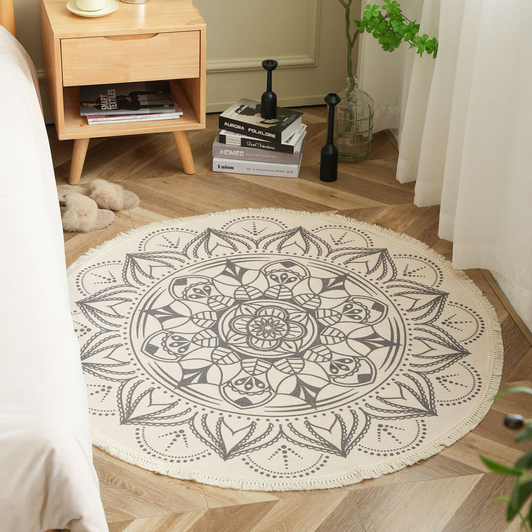 Round woven rug with mandala motif, flat cotton-jute mix and fringes
