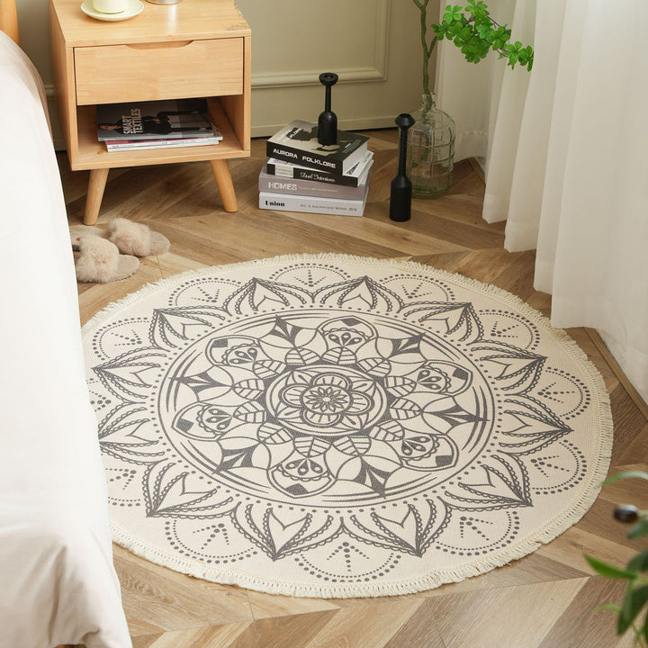 Round woven rug with mandala motif, flat cotton-jute mix and fringes