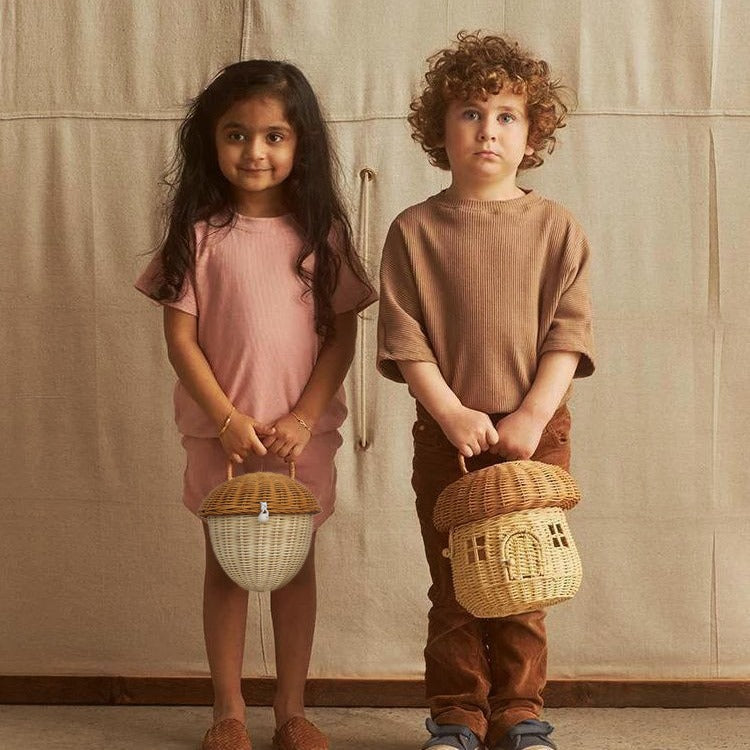Playful storage basket in acorn design