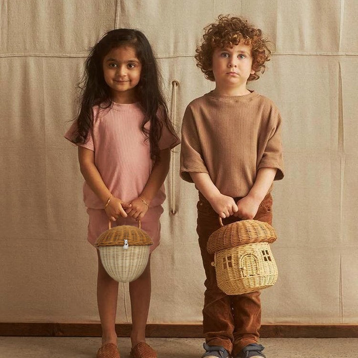 Playful storage basket in acorn design