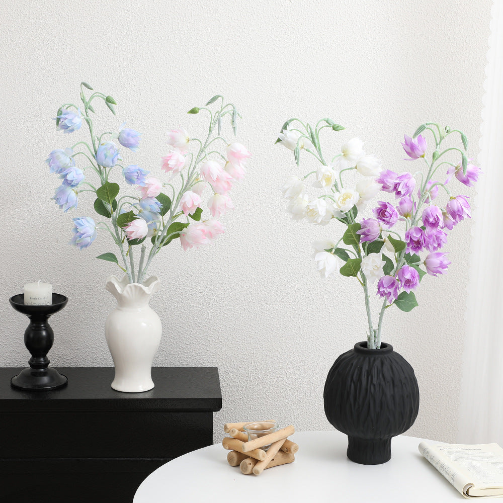 Artificial orchid bouquet with intricate flowers