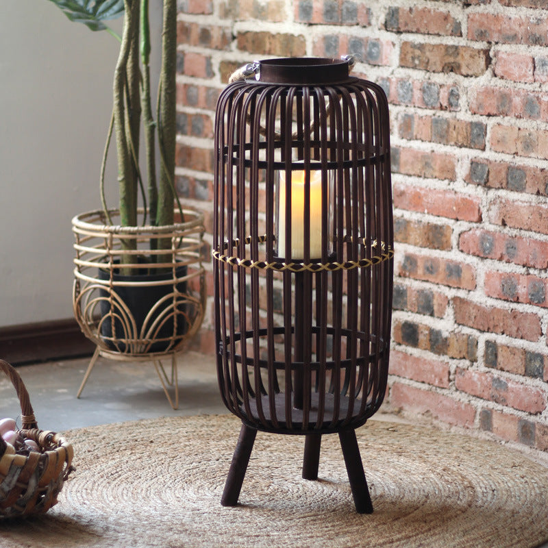 Stylish lantern made of rattan with wooden frame