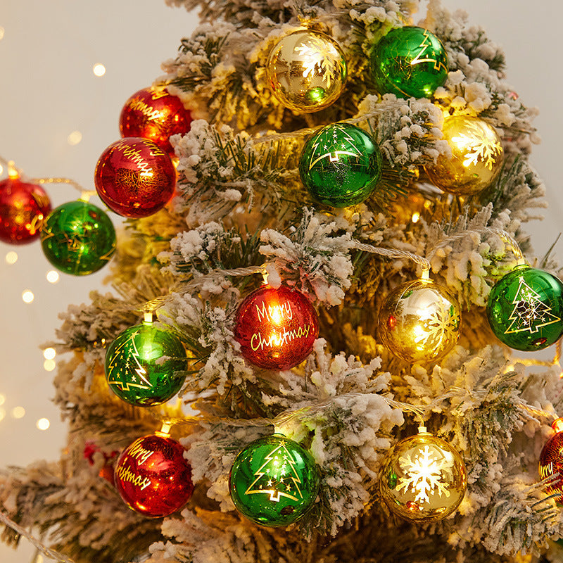 Festive string lights with Christmas ornaments
