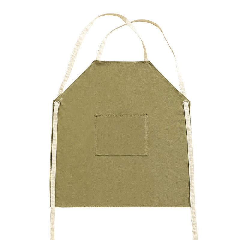 Adjustable cotton cooking apron with cross straps and large front pocket