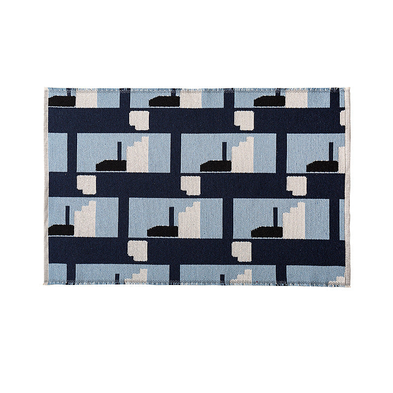 Modern geometric bathroom rug made of flat-woven cotton with non-slip backing