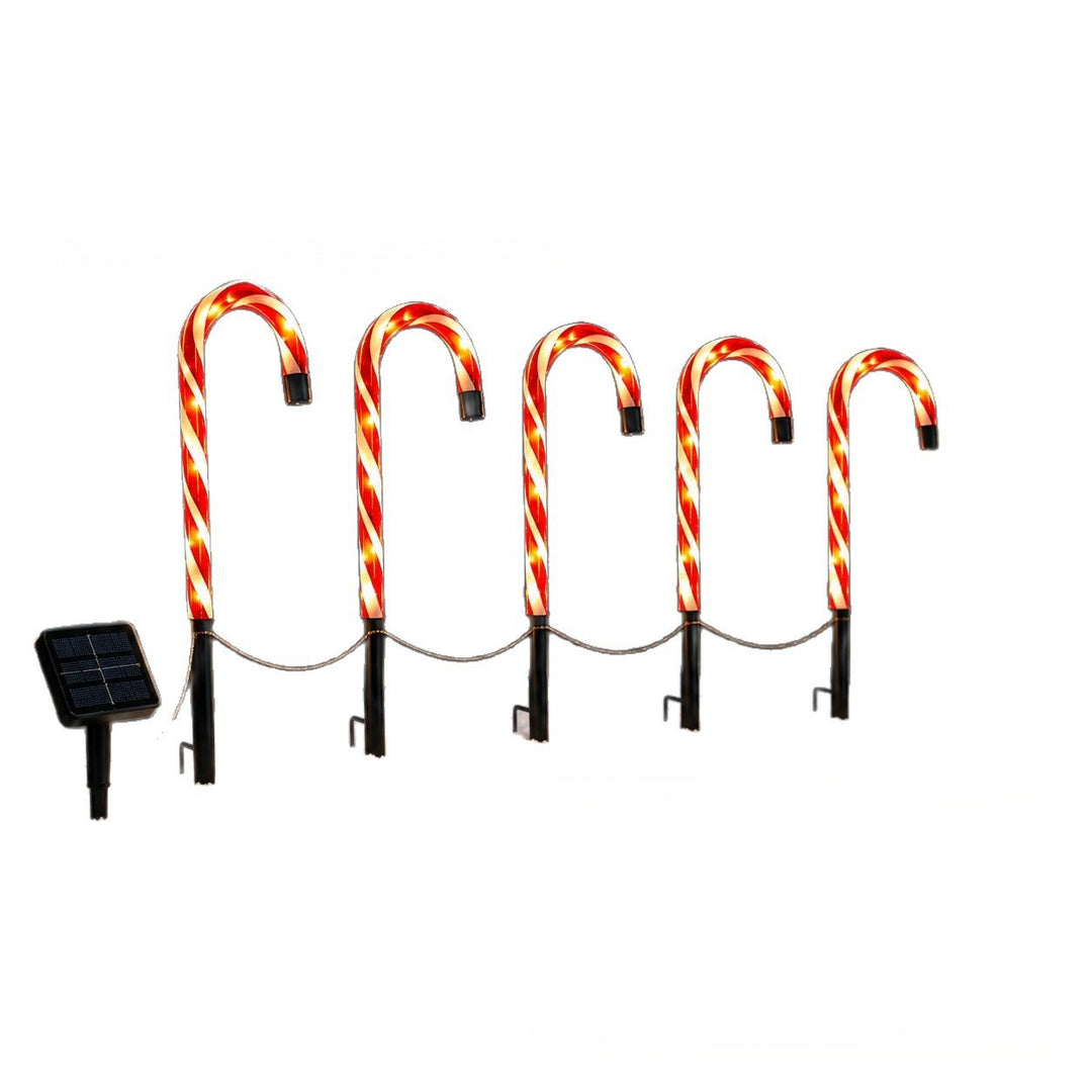 Solar-powered projecting candy cane path lights