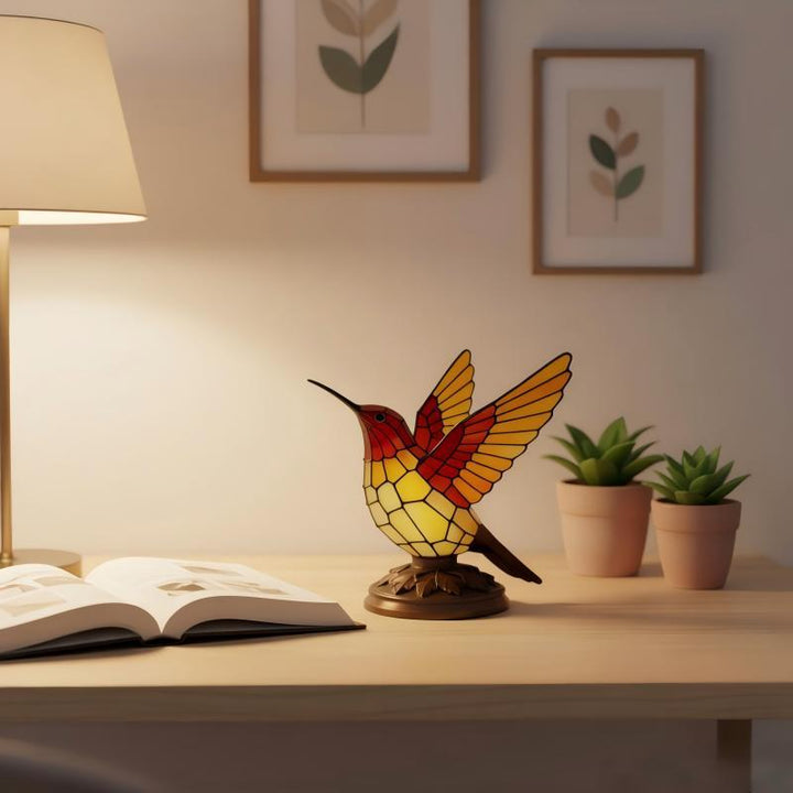 Decorative table lamp in the shape of a hummingbird