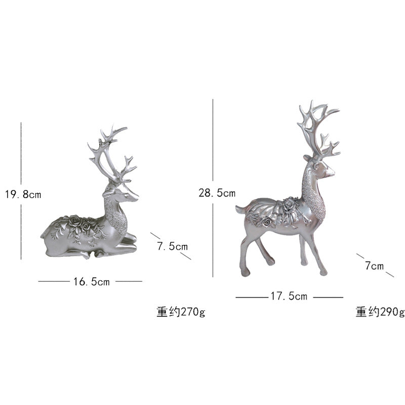 Artful decorative figure of a magnificent deer with floral details