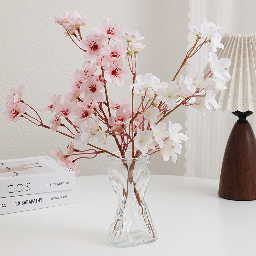 Artificial cherry blossom branch with detail-loving flowers
