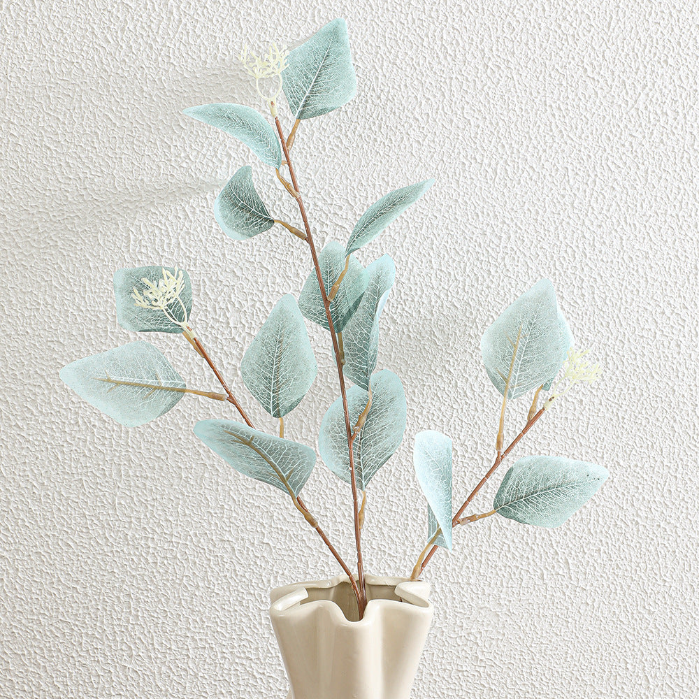 Decorative artificial flower branch with delicate leaves