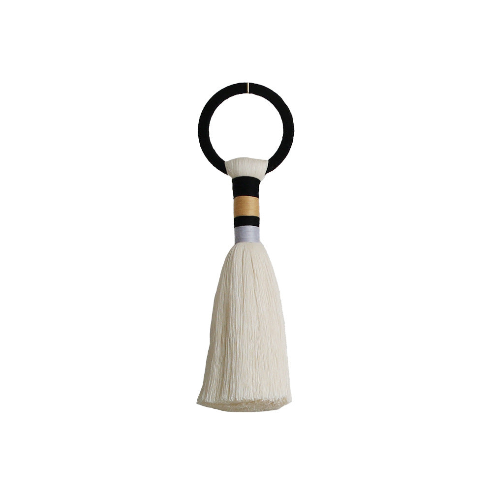 Wall decoration with elegant tassel design