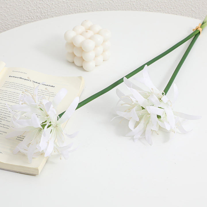 Artificial blossom branch with delicate flowers