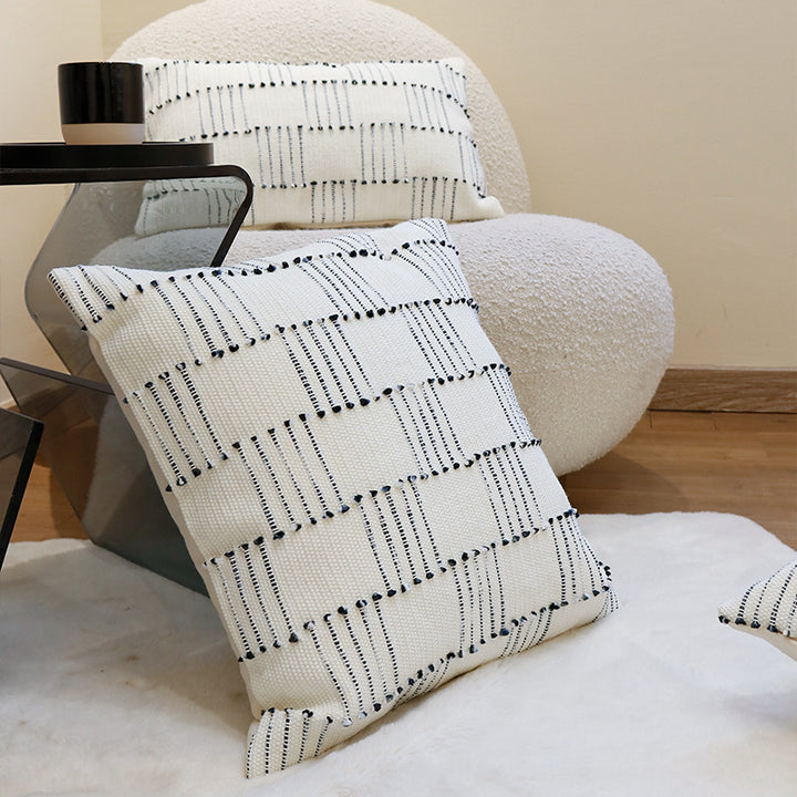 Handwoven cotton cushion cover with striped relief structure and concealed zipper