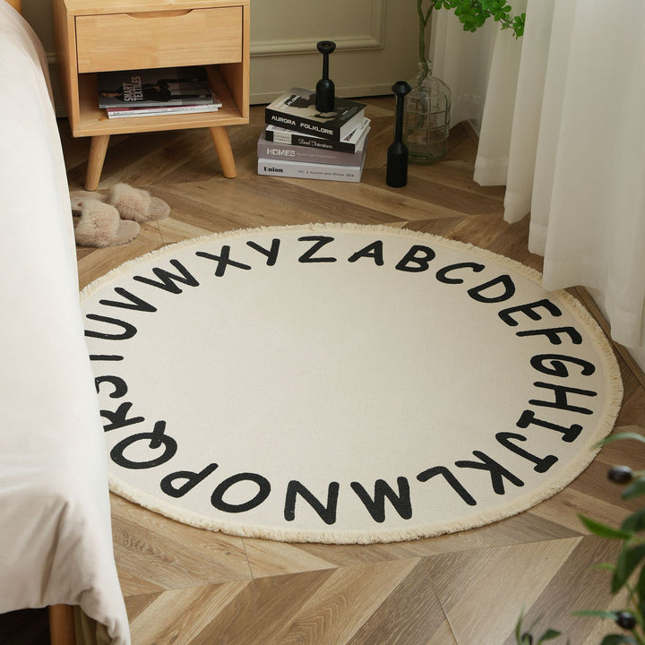 Round woven rug with mandala motif, flat cotton-jute mix and fringes
