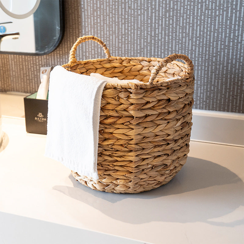 Handwoven decorative basket with heart motif