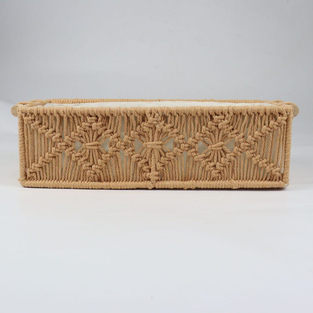Storage basket with macrame pattern