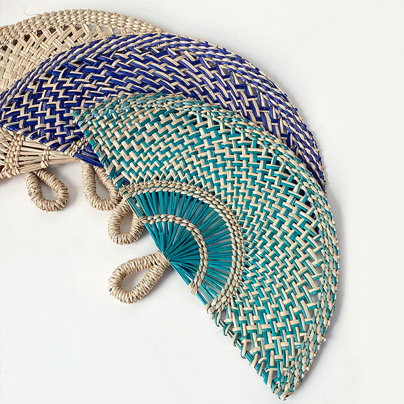Handcrafted fan made of woven seagrass