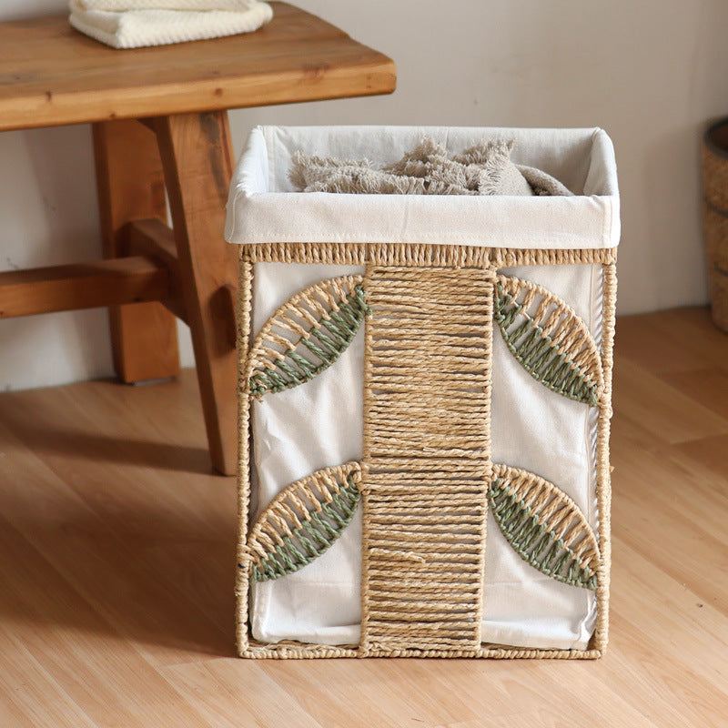 Elegant laundry basket made of natural wicker with fabric lining