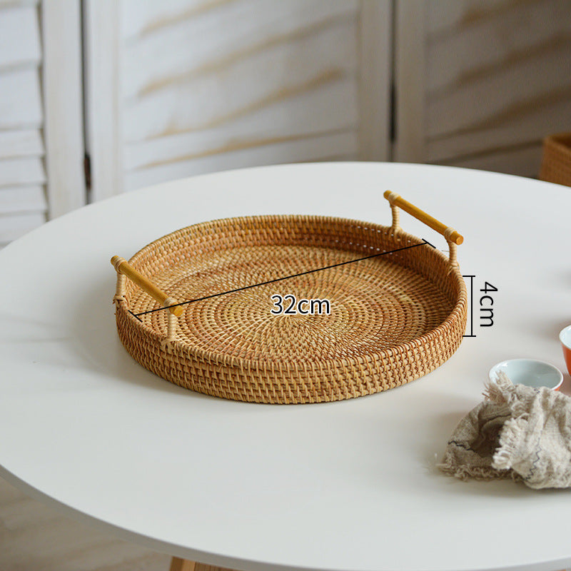 Round serving platter made of braided rattan