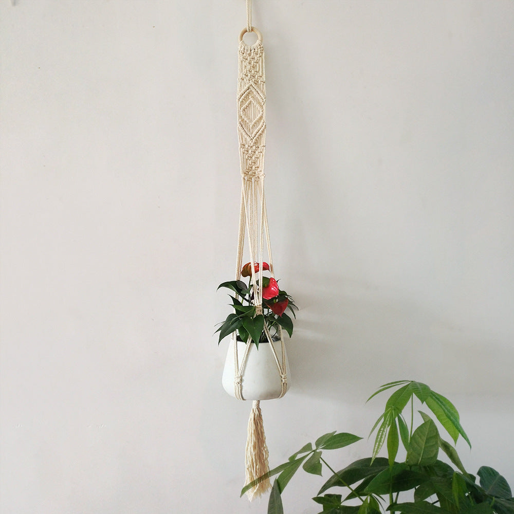 Macrame plant hanger with decorative tassels