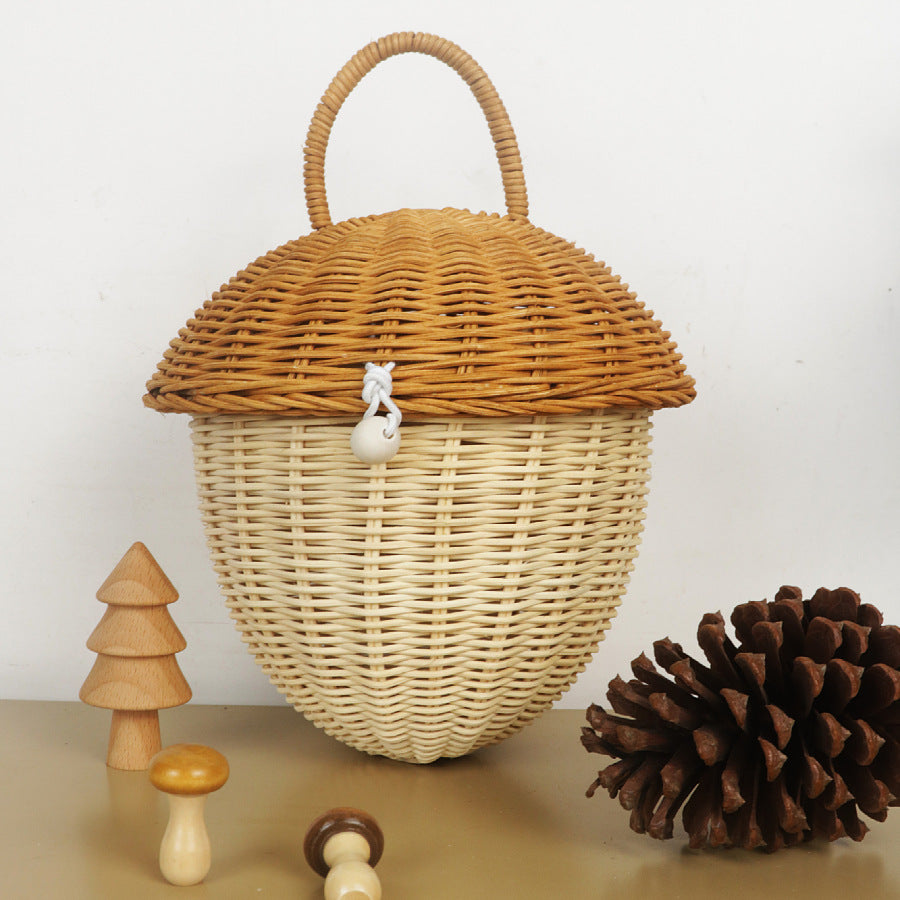 Playful storage basket in acorn design