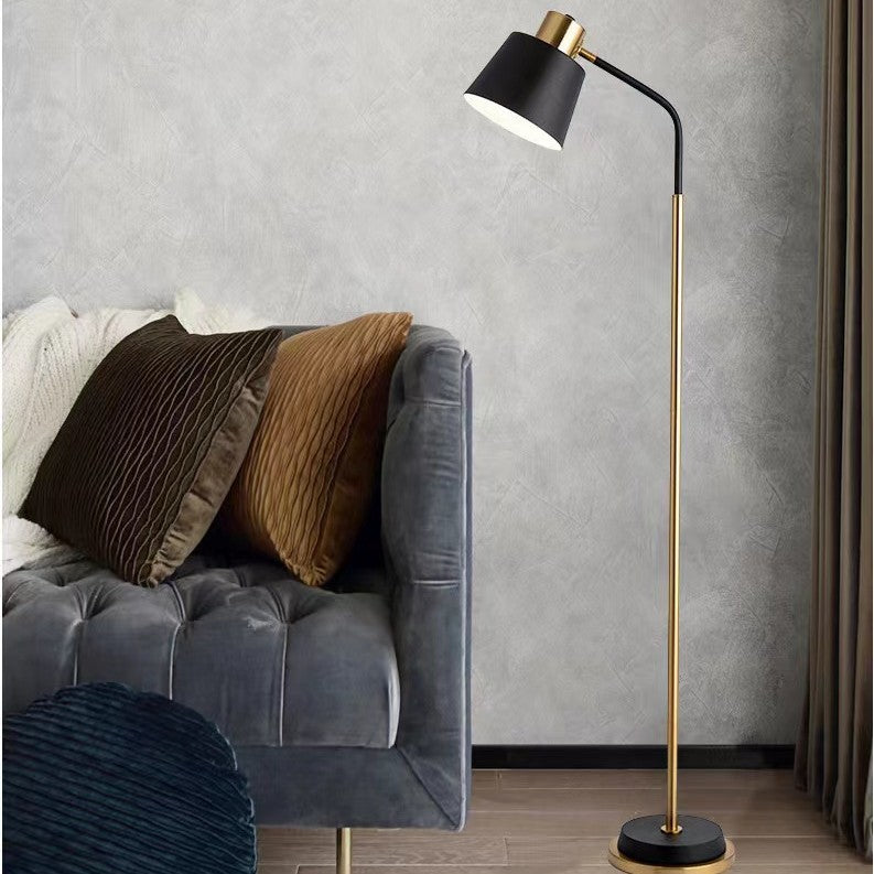 Slim Brass Torchiere Floor Lamp with Tilted Cone Shade and Adjustable Neck