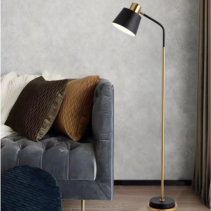 Slim Brass Torchiere Floor Lamp with Tilted Cone Shade and Adjustable Neck