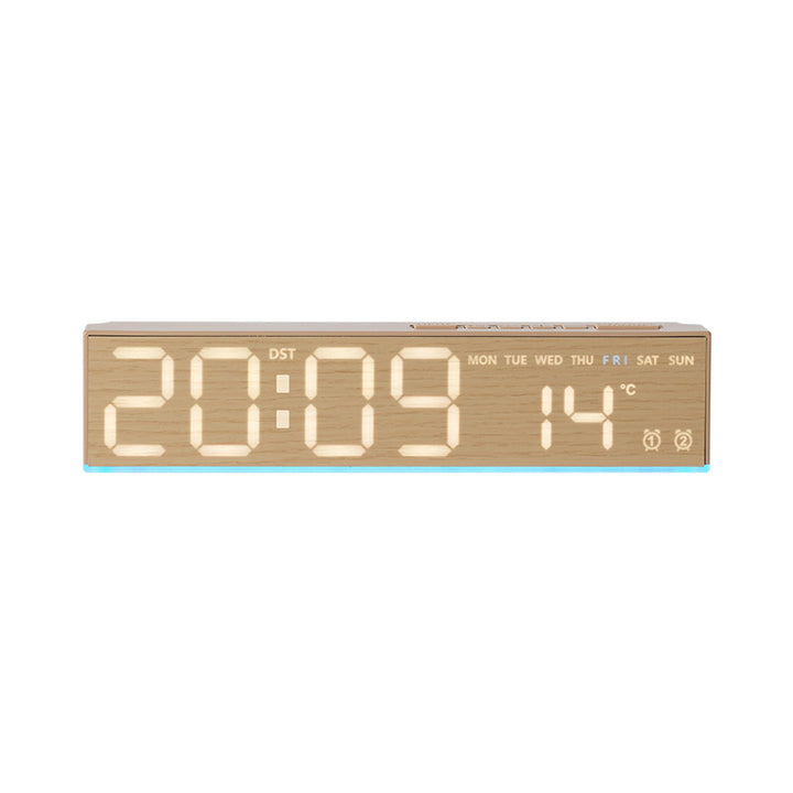 Digital alarm clock with temperature sensor and week display