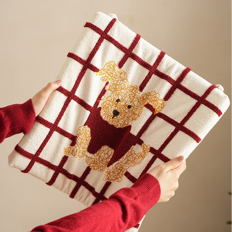 Square seat cushion with appliquéd dog motif, padded filling and attachment straps