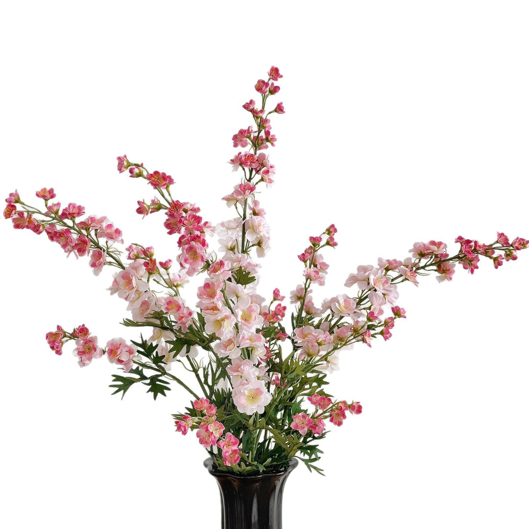 Artificial flower branch with intricately detailed red flowers