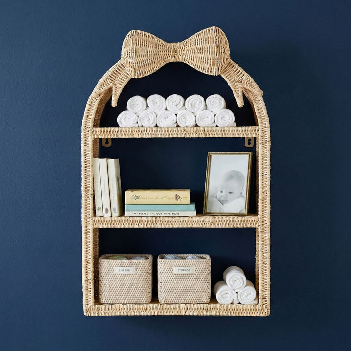 Basket shelf with bow motif