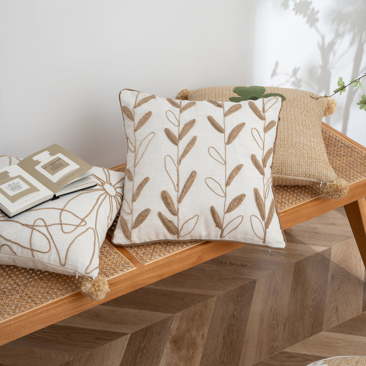 Decorative linen cushion with hand-stitched jute application