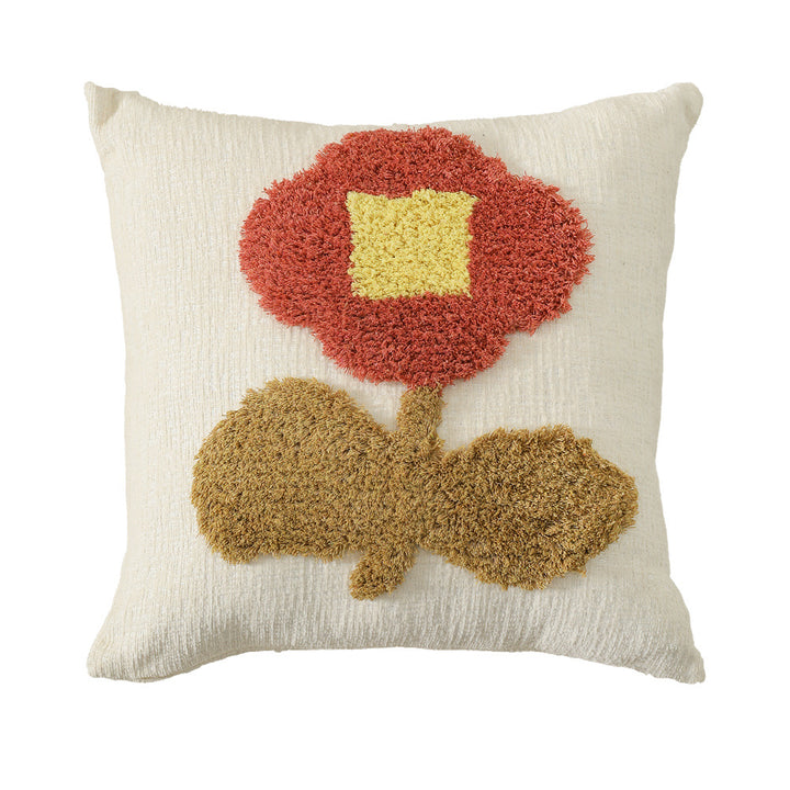 Decorative tufted cushion cover with hand-tufted flower applique