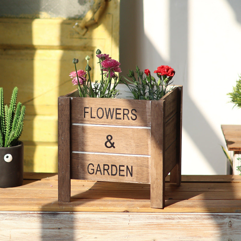 Decorative wooden box for plants