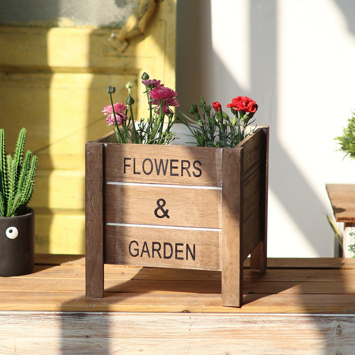 Decorative wooden box for plants