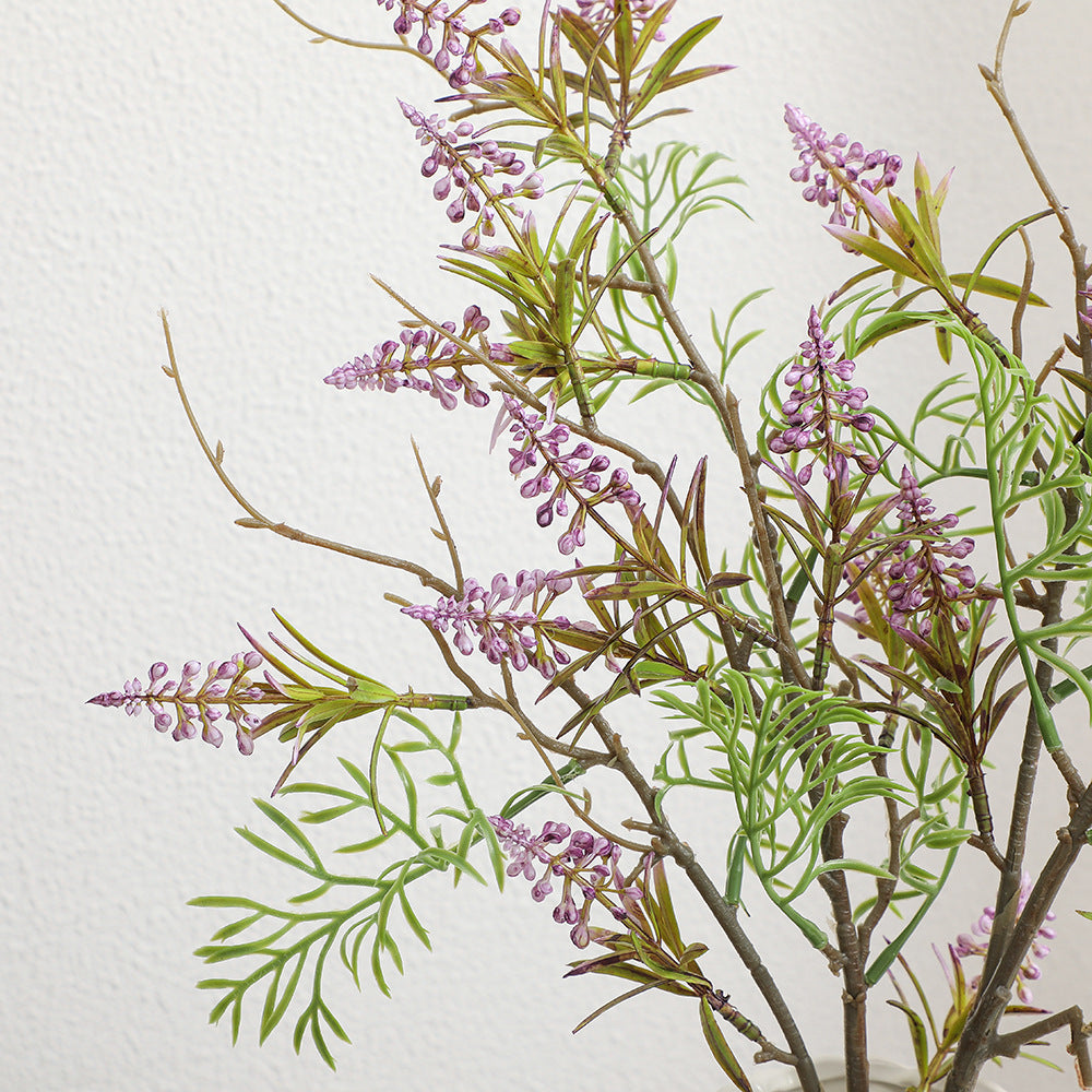 Artificial plant with decorative flowers