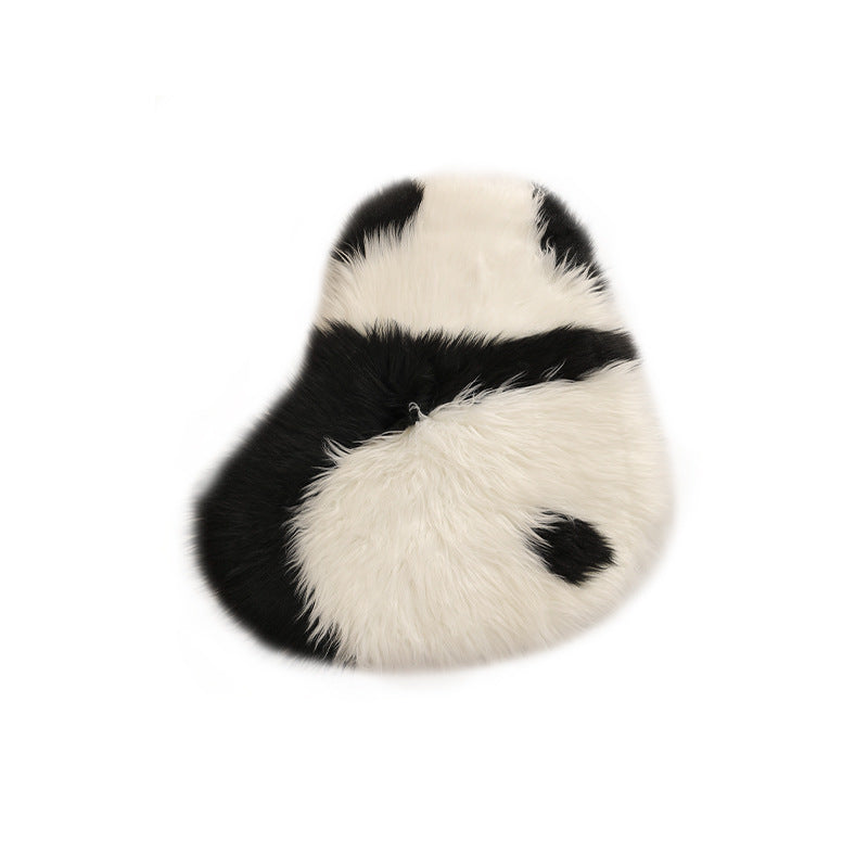 Plush cuddly pillow in sheep shape with dense artificial fur and soft polyester filling