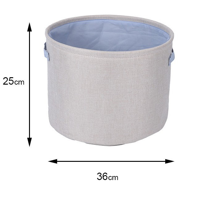 Organizer basket with practical handle and water-repellent inner coating