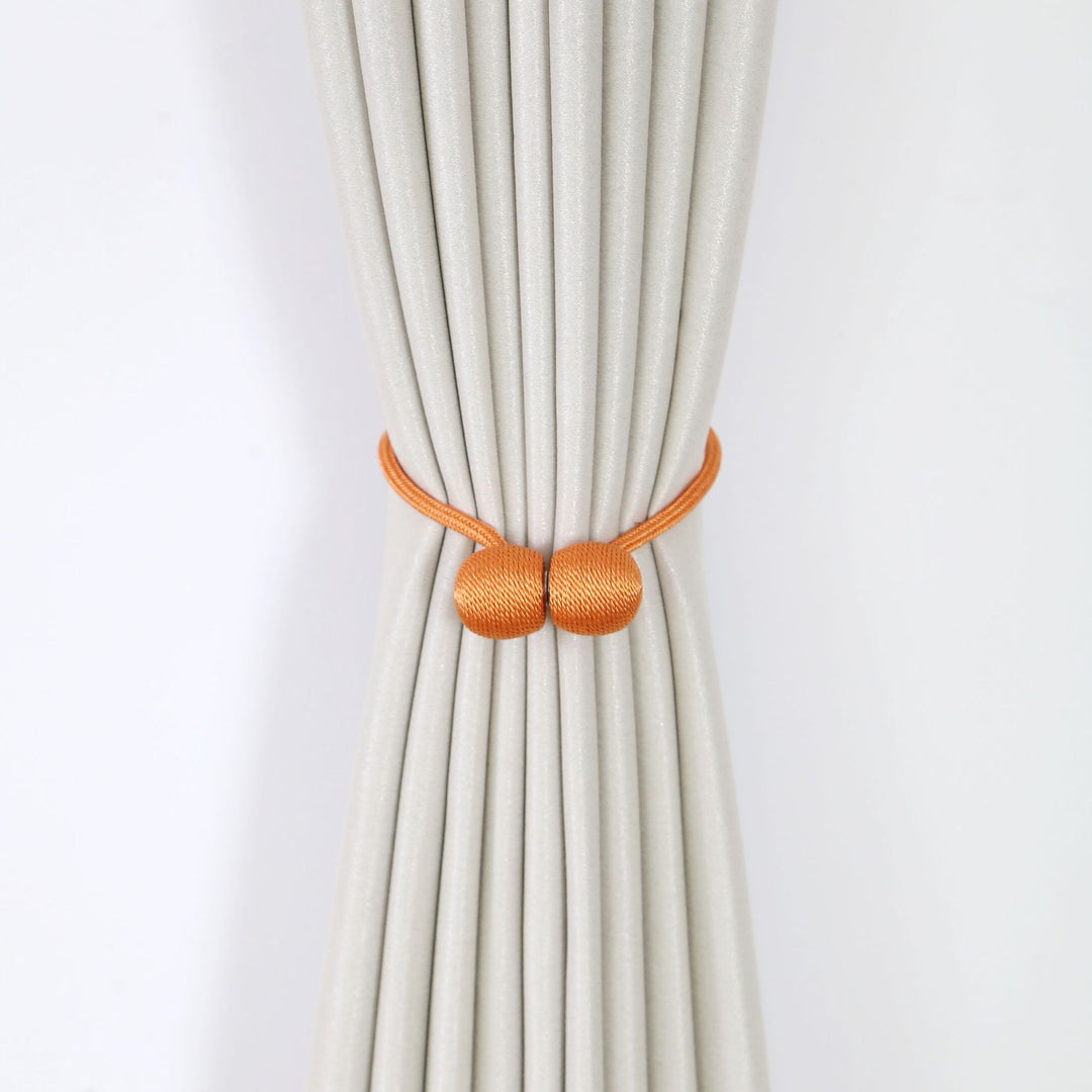 Decorative curtain tieback