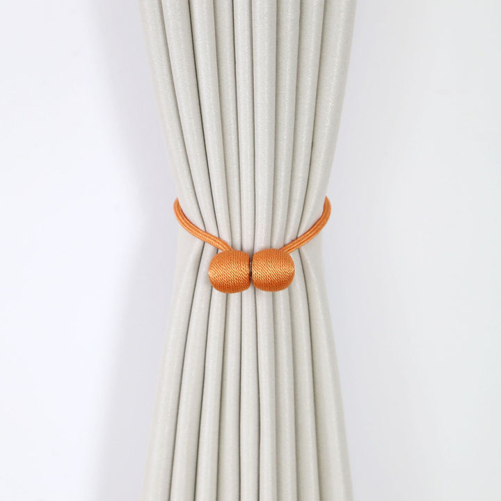 Decorative curtain tieback