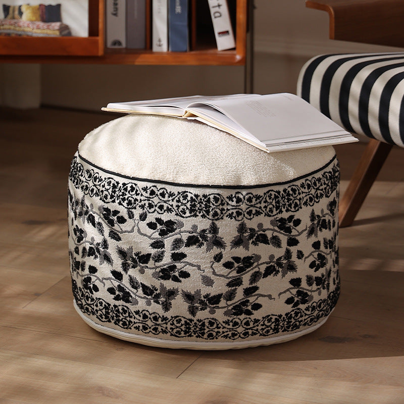 Flower-shaped floor pouf with cuddly teddy fleece surface and removable cover