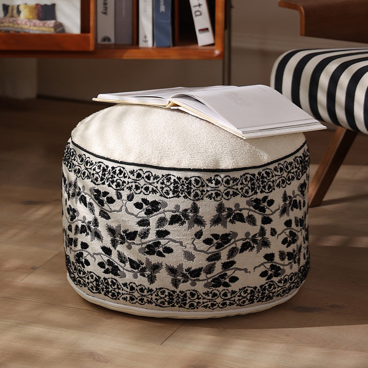 Flower-shaped floor pouf with cuddly teddy fleece surface and removable cover