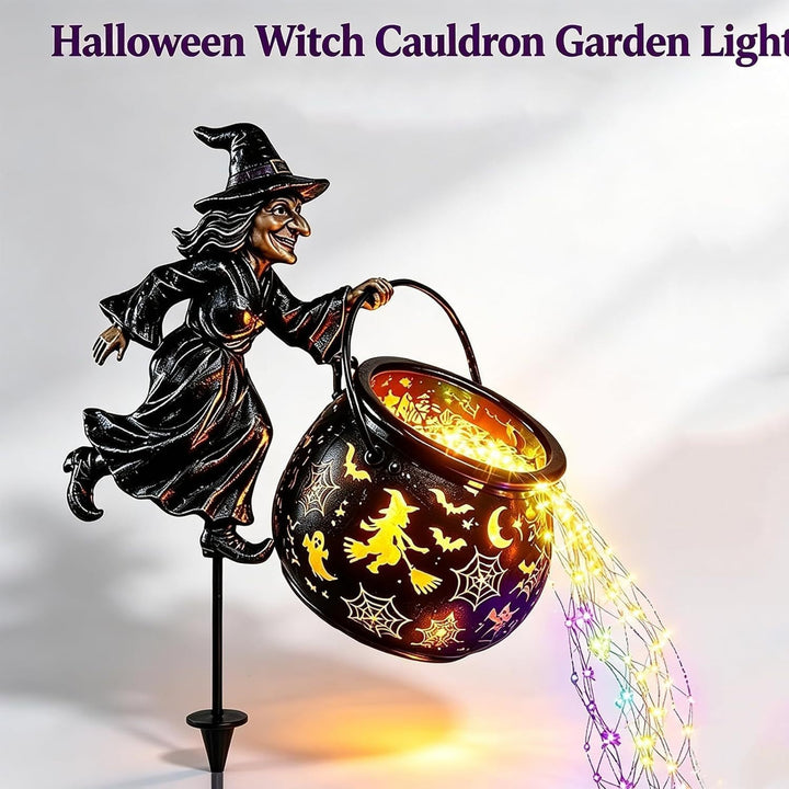 Garden decoration with illuminated witch figure
