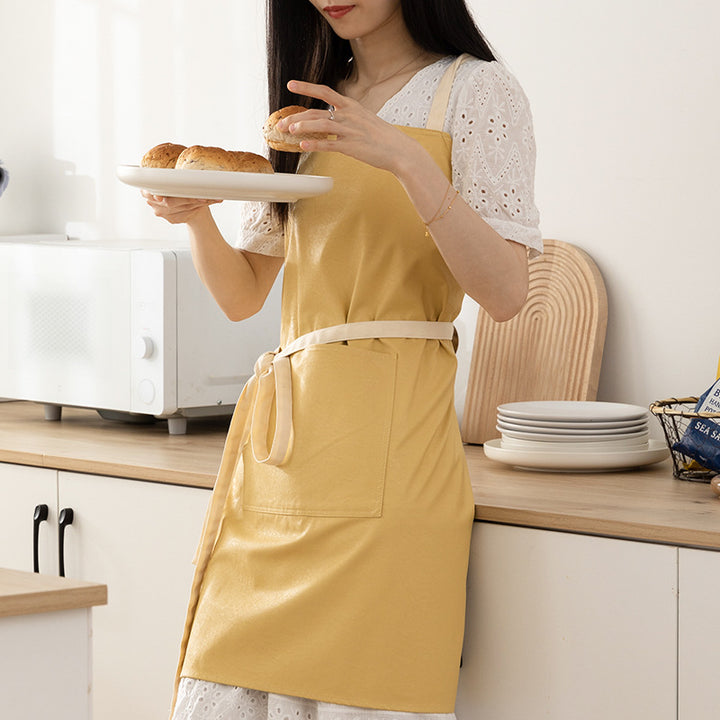 Adjustable cotton cooking apron with cross straps and large front pocket