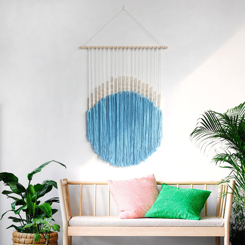 Decorative wall art with wooden beads and thread pendulum