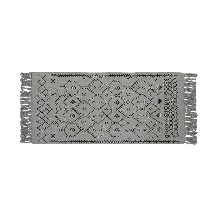 Flat-woven entrance and living room rug with Moroccan diamond jacquard and decorative fringes